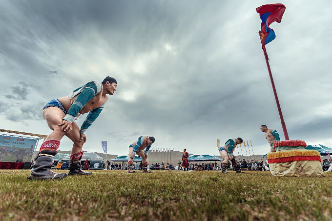 Mongolian wrestler participating in the Besreg Naadam festival