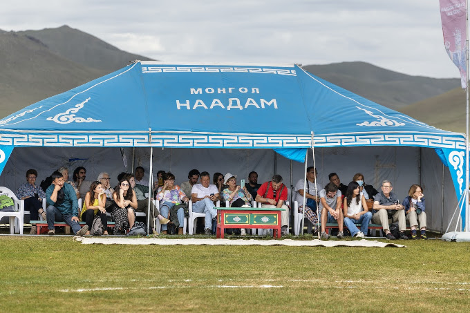 Guests watching the Besreg Naadam festival