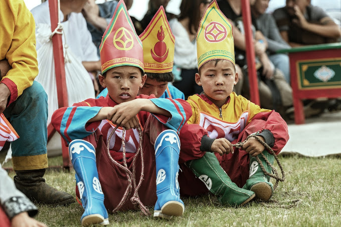 Young participants wearing traditional Mongolian festival clothing