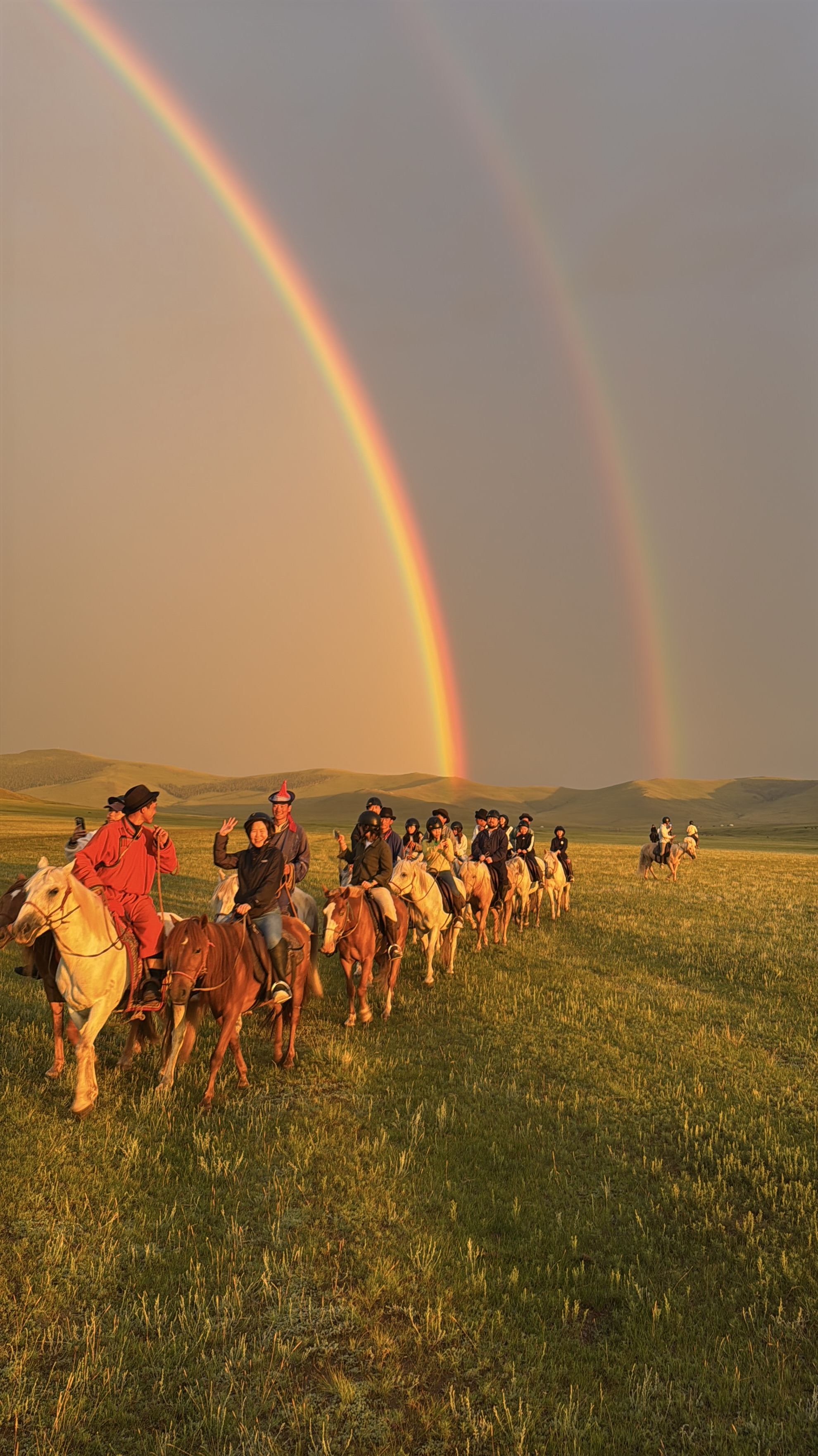 Mongolian archer on horseback overlooking a nomadic camp